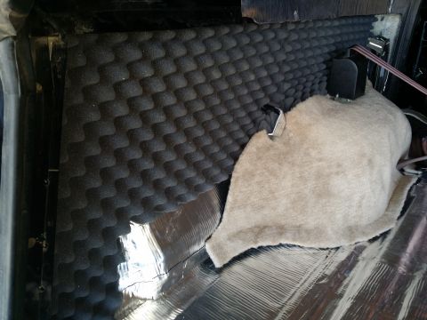 1994 Ford Bronco - Soundproofing foam and insulation are being installed in the interior of a 1994 Ford Bronco.