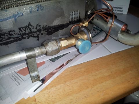 1976 Ford Ranchero - An air conditioning expansion valve is shown, with '76 clearly marked on the housing.