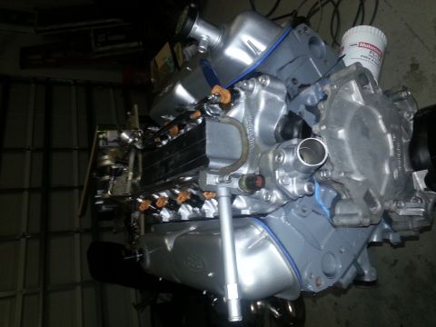 1994 Ford Bronco - Close-up of a Ford V8 engine, likely undergoing maintenance or rebuild.