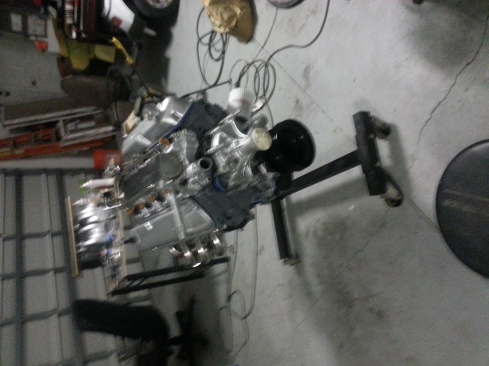 Engine on stand, silver and black