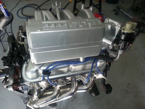 1994 Ford Bronco - A Ford V8 engine is shown, likely undergoing a rebuild or upgrade.