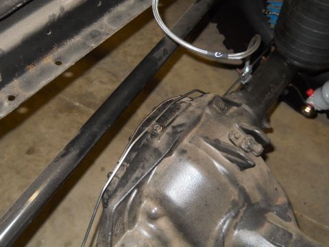1992 Ford Bronco - Transmission housing and frame components are visible in this close-up shot.