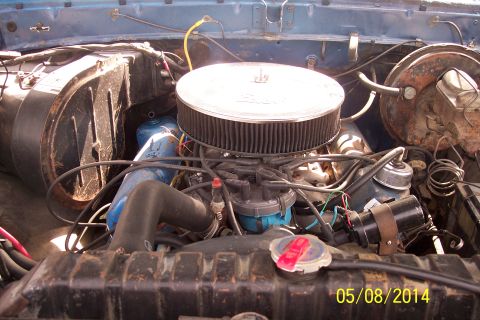 1978 Ford Bronco - Close-up view of a vehicle's engine compartment, showing various components and wiring.