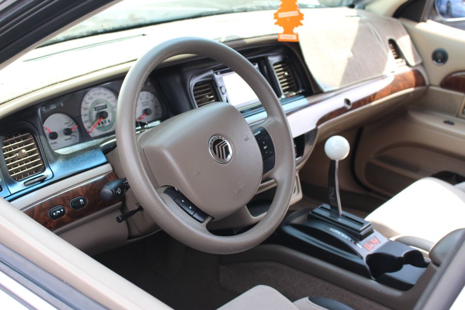 Mercury sedan dash, steering wheel and white cue-ball floor shifter