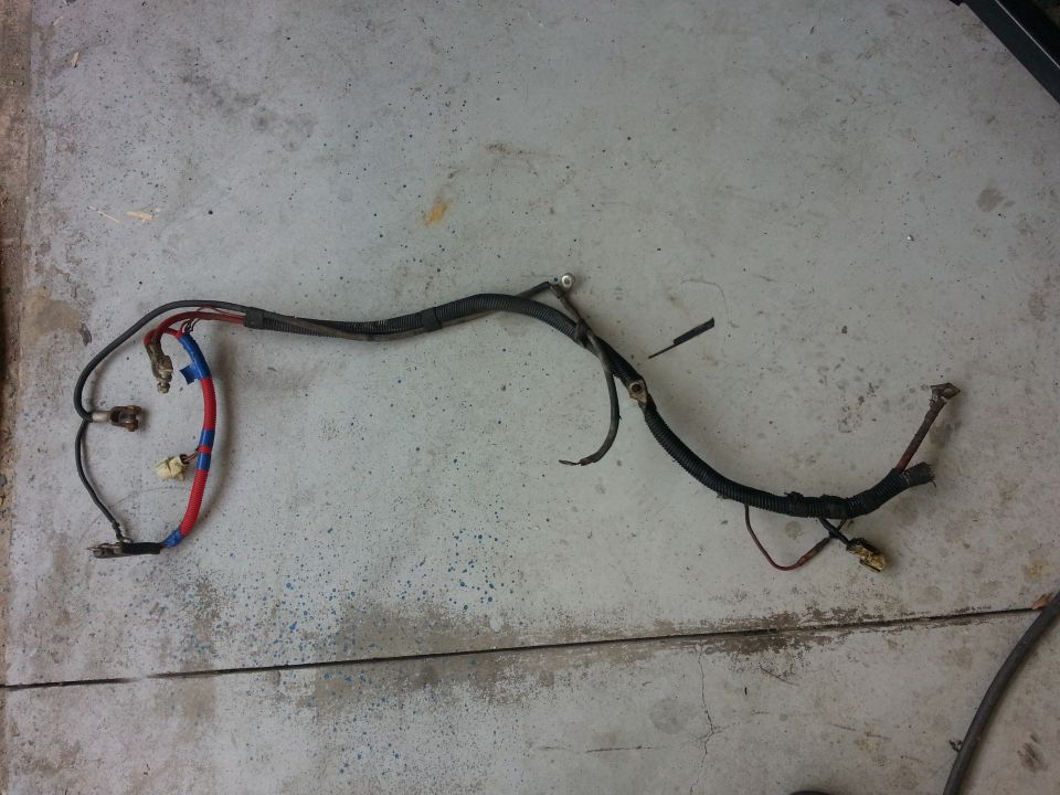 Engine wiring harness with red and blue tape