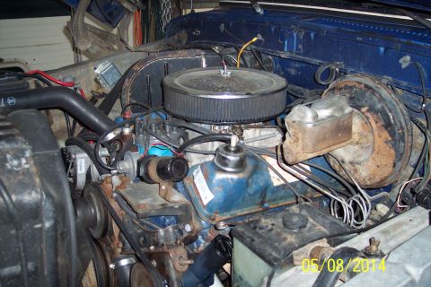 1978 Ford Bronco - Close-up view of the engine bay, showing the air cleaner, brake booster, and various engine components.
