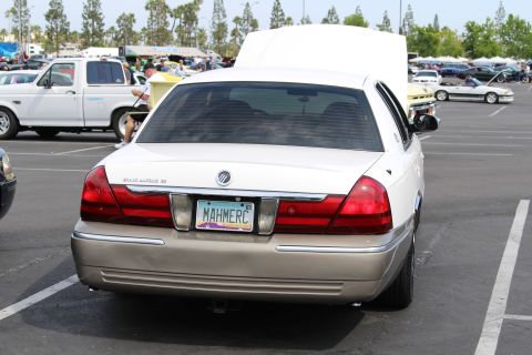 Rear of a two-tone Mercury Grand Marquis LS with MAHMERC plate