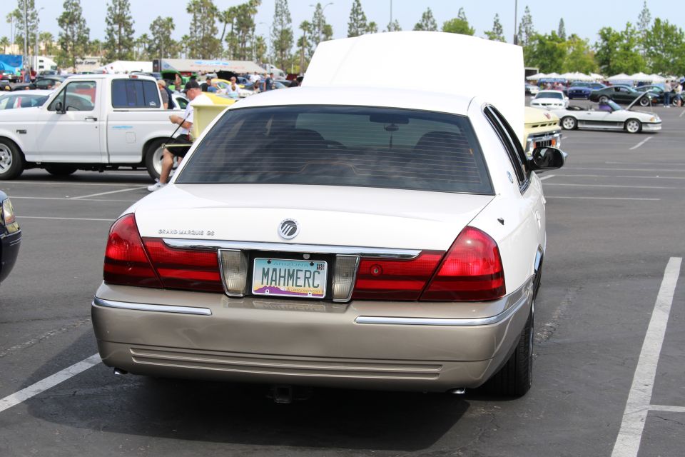 Rear of a two-tone Mercury Grand Marquis LS with MAHMERC plate