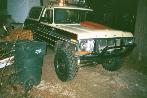 1979 Ford Bronco - This 1979 Ford Bronco features a custom front bumper and an aftermarket hood scoop.