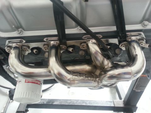 1994 Ford Bronco - Shiny exhaust manifold and Motorcraft oil filter are visible on the engine.