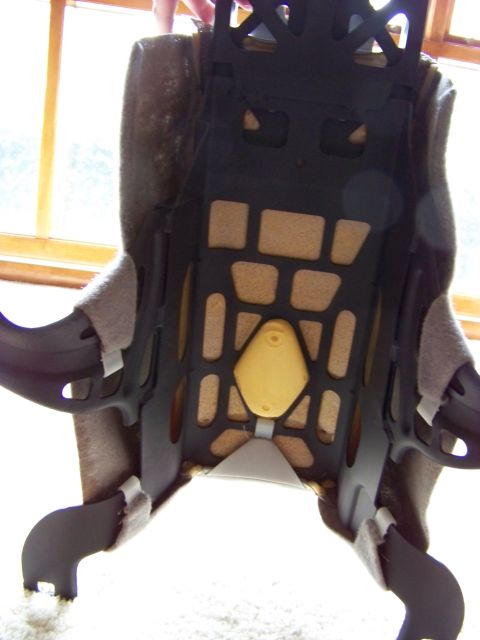 1999 Mercury Grand Marquis - The internal structure of a car seat is visible, showing the frame and padding.