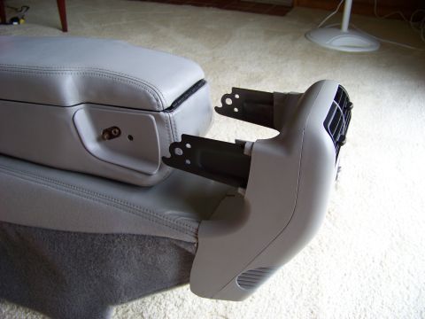 1999 Mercury Grand Marquis - Center console and air vent assembly removed from a vehicle.