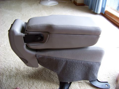 1999 Mercury Grand Marquis - Car center console armrest, likely from a sedan, shown removed from its original vehicle.