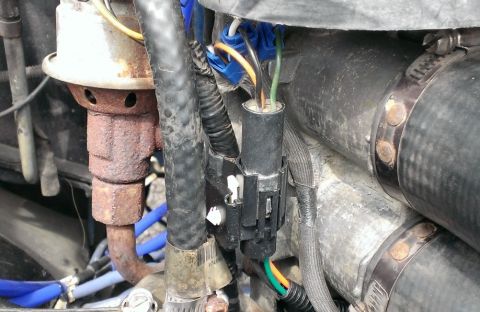 1988 Ford Bronco - New TPS connector and testing configuration tucked way. After this picture was taken, gaps in the splice connections and the ends of the po…