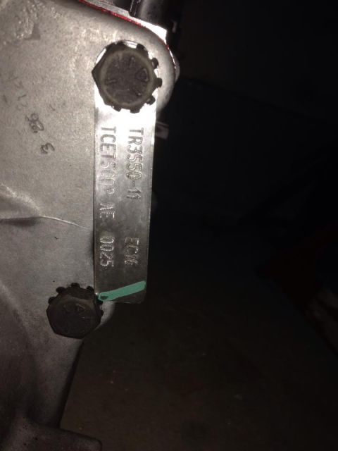 1988 Ford Bronco - Close-up of a metal part with stamped identification numbers and letters.