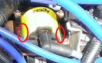 1988 Ford Bronco - While troubleshooting a possible misfire, I noticed the indistinguishable blue spark in between the coil and its mounting base (circled are…