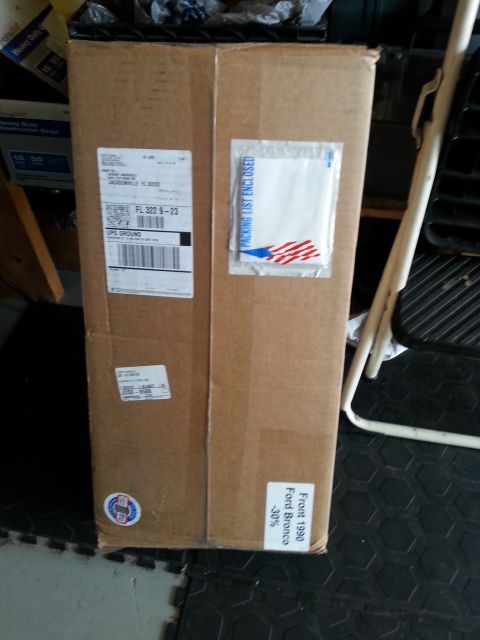 1992 Ford Bronco - A shipping box is shown with multiple labels, including one that specifies 'Front 1990 Ford Bronco'.