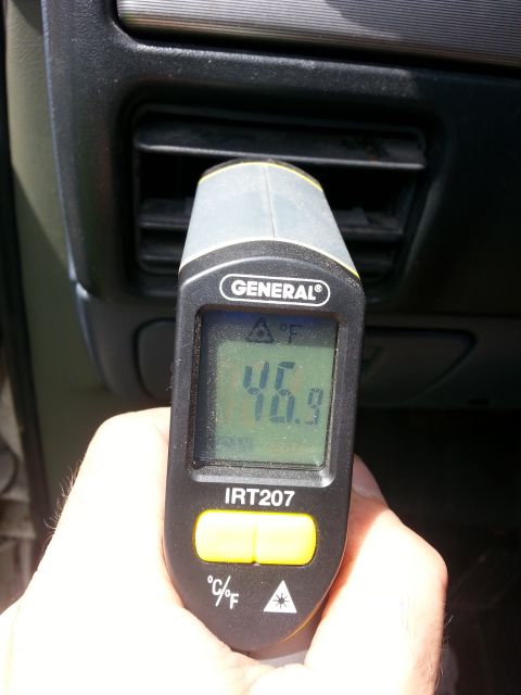 1992 Ford Bronco - Measuring the temperature of an air vent with a General IRT207 infrared thermometer.