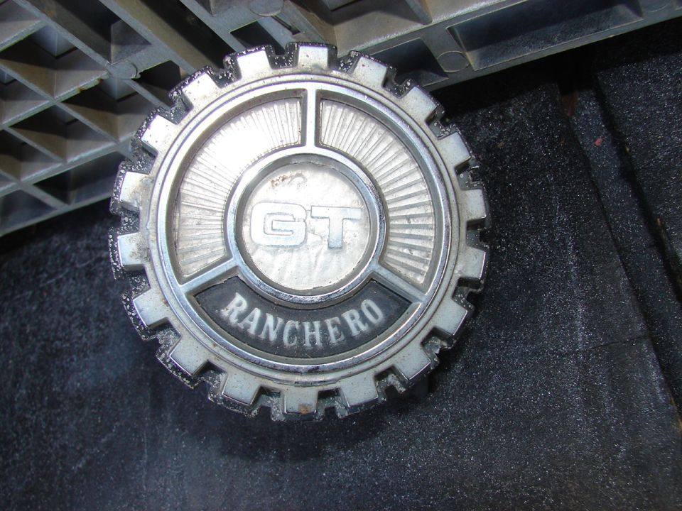 Close-up of a Ranchero GT emblem, likely a hubcap or badge