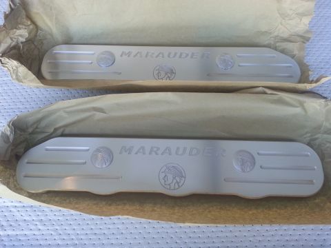 2003 Mercury Marauder - Two new Marauder branded coil covers are shown, each with the Mercury logo and 'Marauder' text.