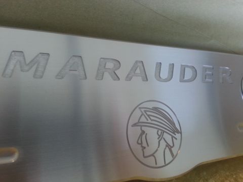 2003 Mercury Marauder - A metal plate with the name Marauder and a Mercury logo is visible.