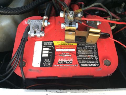 1997 Dodge 3500 - Optima RedTop battery with wiring and a brass switch attached to the terminals.