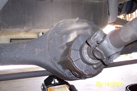 1978 Ford Bronco - Close-up view of a vehicle's rear differential and driveshaft assembly.