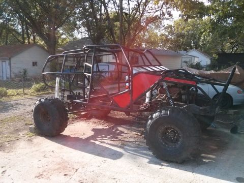 1986 Ford Bronco - Custom buggy build in progress, showing exposed frame and suspension components.