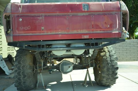 1979 Ford Bronco - This heavily modified truck features oversized tires and a custom rear bumper with propane tanks installed.
