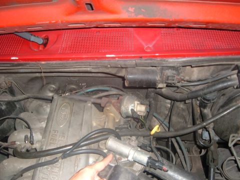 1988 Ford Bronco - Engine bay detail showing Ford fuel injection system components and wiring.