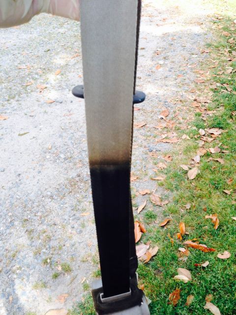 1979 Ford Bronco - Close-up of a dirty seatbelt, showing a gradient from light to dark.