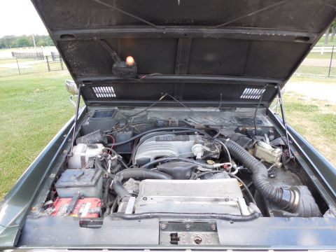 1975 Ford Bronco - The black plastic sheets above the headlights are the same material as the wheelwell liners, and they prevent engine bay air from recircula…