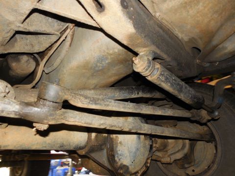 1975 Ford Bronco - Looking rearward from the RHF tire at the oil pan & front diff