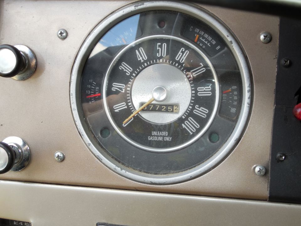 The odo shows 87,725, but I can't remember now if or when it was zeroed.  If it was zeroed during the first build (The Beginning), then this would be the mileage on the transmission because it was rebuilt then.  My best guess on engine mileage (which has never been rebuilt) is just past 200Kmi; t-case was replaced recently in Memphis, so it has virtually 0mi; rear diff was replaced a few years ago in Memphis, so maybe 40Kmi; front diff was cleaned in NC, but NOT rebuilt, so I have no idea of its miles.

The stock ammeter was removed during the 3G alternator conversion, and it was replaced with a SunPro voltmeter using a MarsChariot (ClassicBroncos.com) face.  The oil, fuel, & temperature gauges work.