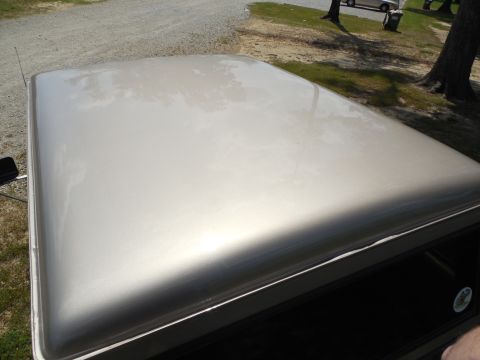 1975 Ford Bronco - Those are reflections of clouds & trees - the paint is immaculate.
