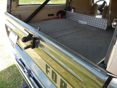 1975 Ford Bronco - Note the fine rub-line across the top edge of the t/g where the liftgate seal touches the paint. The diamond-plate water tank, & pump are c…