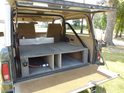 1975 Ford Bronco - The t/g carpet is easy to R&I when Frank is carrying hunting dogs (about 3 days a week). He allows them to climb down from their kennels on…
