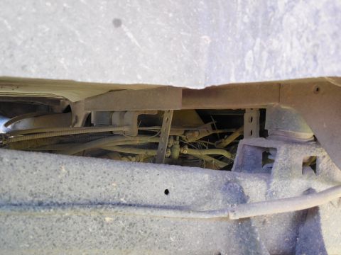 1975 Ford Bronco - RHR wheelwell looking forward across the frame.