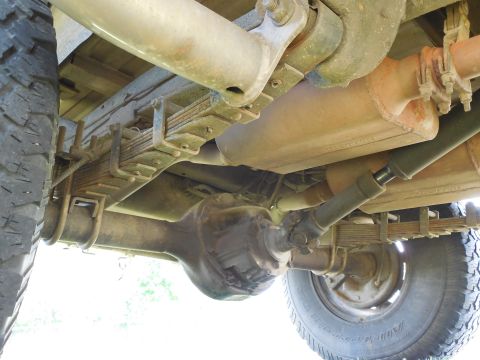1975 Ford Bronco - RHR wheelwell looking rearward under the frame. The drain holes I added to the nerf steps before powdercoating appear to have been effectiv…