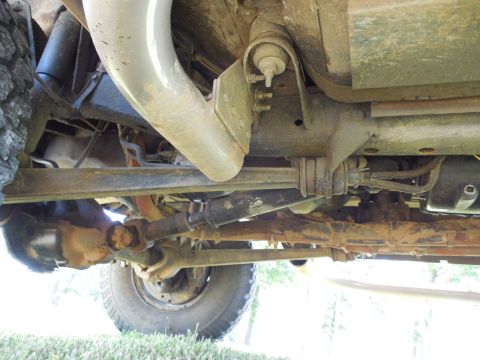 1975 Ford Bronco - LHS looking forward under the frame. Note the extra holes on the bottom face of the frame behind the radius arm nut which I added to instal…