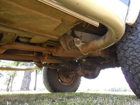 1975 Ford Bronco - LHS looking rearward under the frame. The drain holes I added to the nerf steps before powdercoating appear to have been effective.