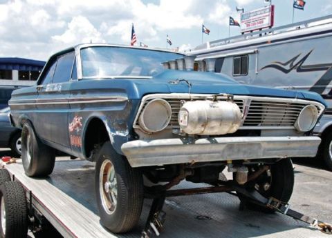 1968 Ford Mustang - Modified 1964 Ford Falcon drag car being transported on a trailer.