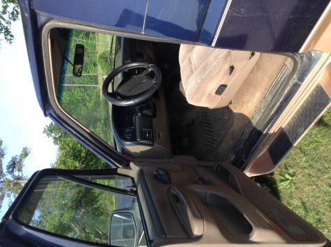 1995 Ford Bronco - Interior view of a 1995 Ford Bronco, highlighting the driver's side.