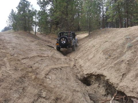 2005 Jeep Wrangler - Jeep Wrangler navigates a challenging off-road trail.