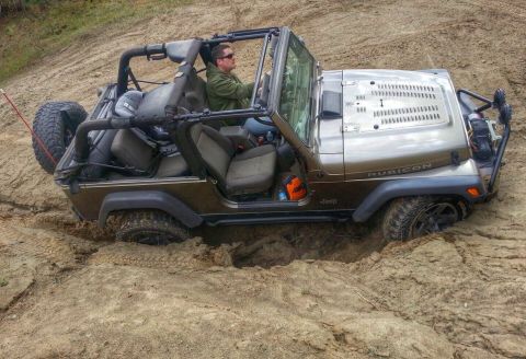 2005 Jeep Wrangler - Jeep Wrangler stuck in a dirt pit during an off-road excursion.