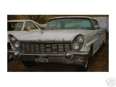 1960 Lincoln Premiere - Front view of a 1960 Lincoln Premiere, showing its distinctive grille and headlights.