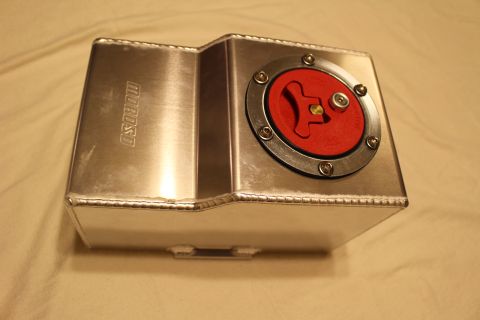2003 Ford Crown Victoria - welded aluminum fuel cell with a stepped top, red flip-up filler cap and an embossed Moroso logo on the side.