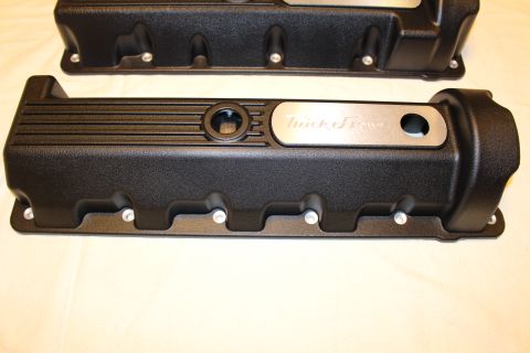 2003 Ford Crown Victoria - black ribbed engine valve cover with an oil-fill grommet and polished aluminum Trick Flow accent plate.