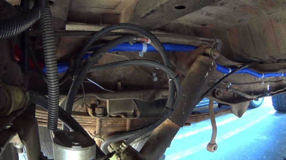 New wiring in blue split-loom.