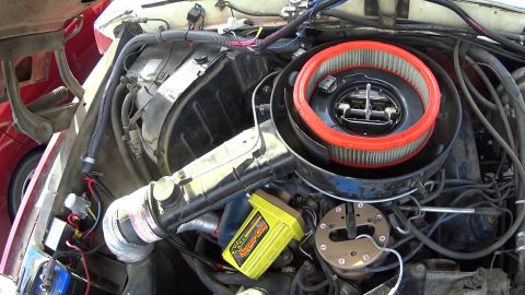 1978 Ford Bronco - Close-up view of an engine bay, an air filter housing and an Accel Super Coil ignition module.